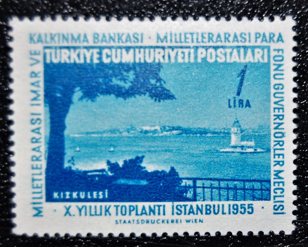 9 1955 Yilinda Isztanbulda toplanan Uluslararasi Imar ve Kalkinma Bankasi Para Fonu Guvernorler toplantisi icin cikarilmis hatira pulu uzerinde yer alan Kiz Kulesi T.T